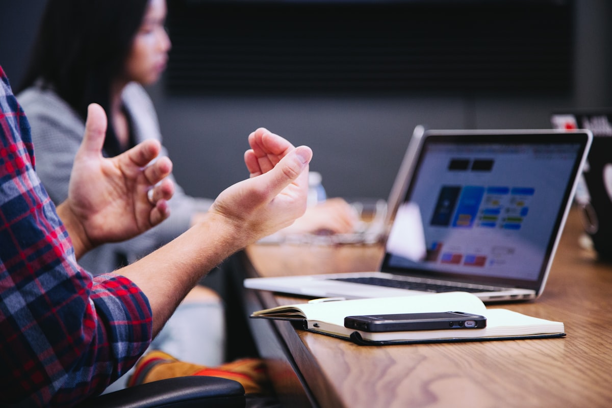 Meeting across a table with documents between counsel and client